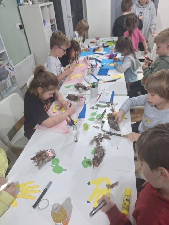 Children making and decorating crafts together at Sirhowy Valley Hub